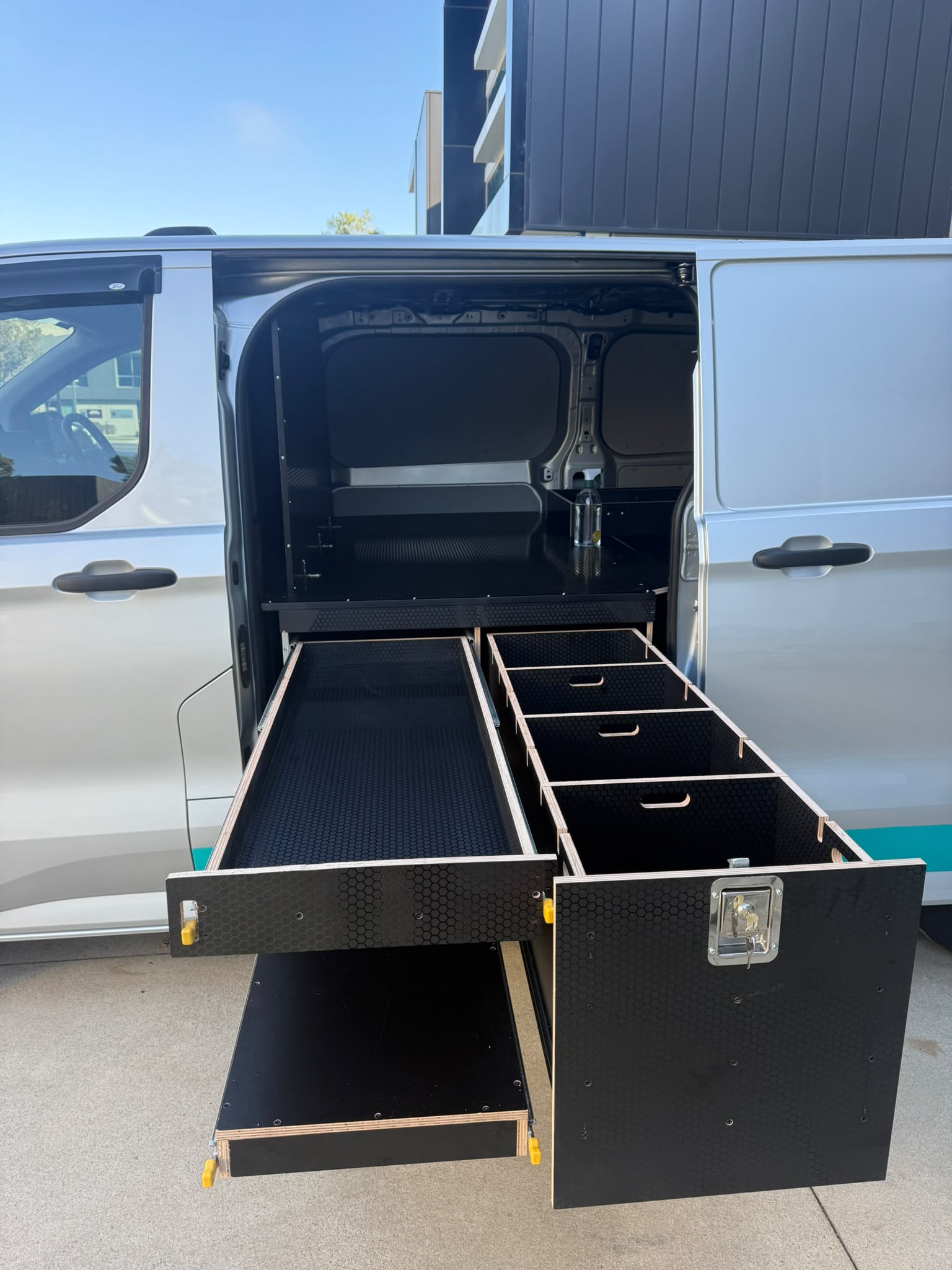 Storage system for a trade van